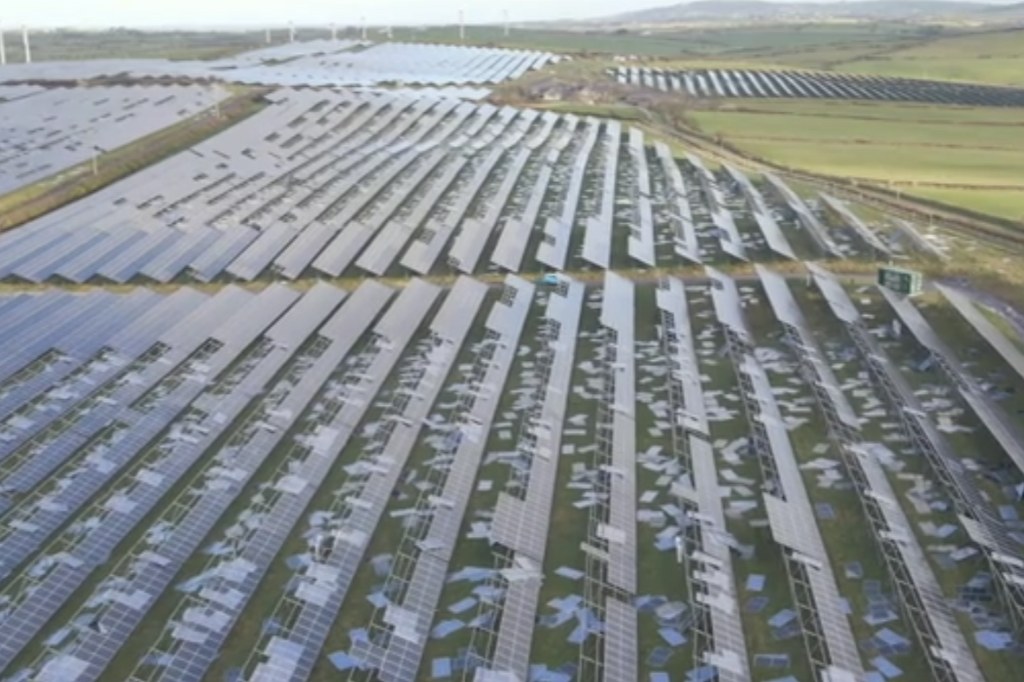 Storm Darragh damage at a solar farm on the Isle of Anglesey, showing broken panels and flooding